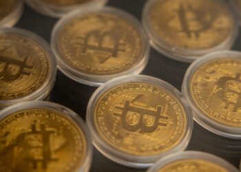 Bitcoin stabilizes after tariff whiplash briefly sends price below $65,000