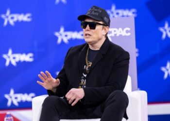 Elon Musk Appears As ‘The Dogefather’ While Petting A Shiba Inu In AI Video, Discusses DOGE’s Wedding And Private Keys