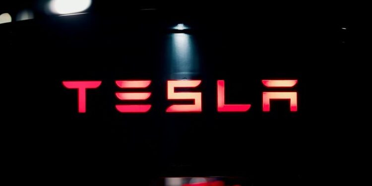 Tesla holds bitcoin steady, reports $112M impairment loss