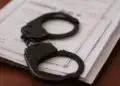 The organizer of a fraudulent cryptocurrency exchange network has been served with a notice of suspicion