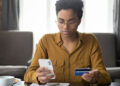 How Distressed Are Consumers? Reconciling Diverging Credit Card Delinquency Measures